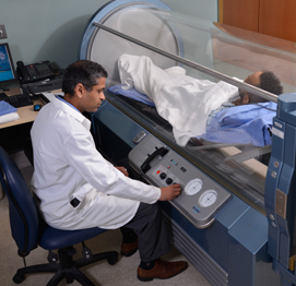 a person receiving hyperbaric treatment in Brooklyn NY